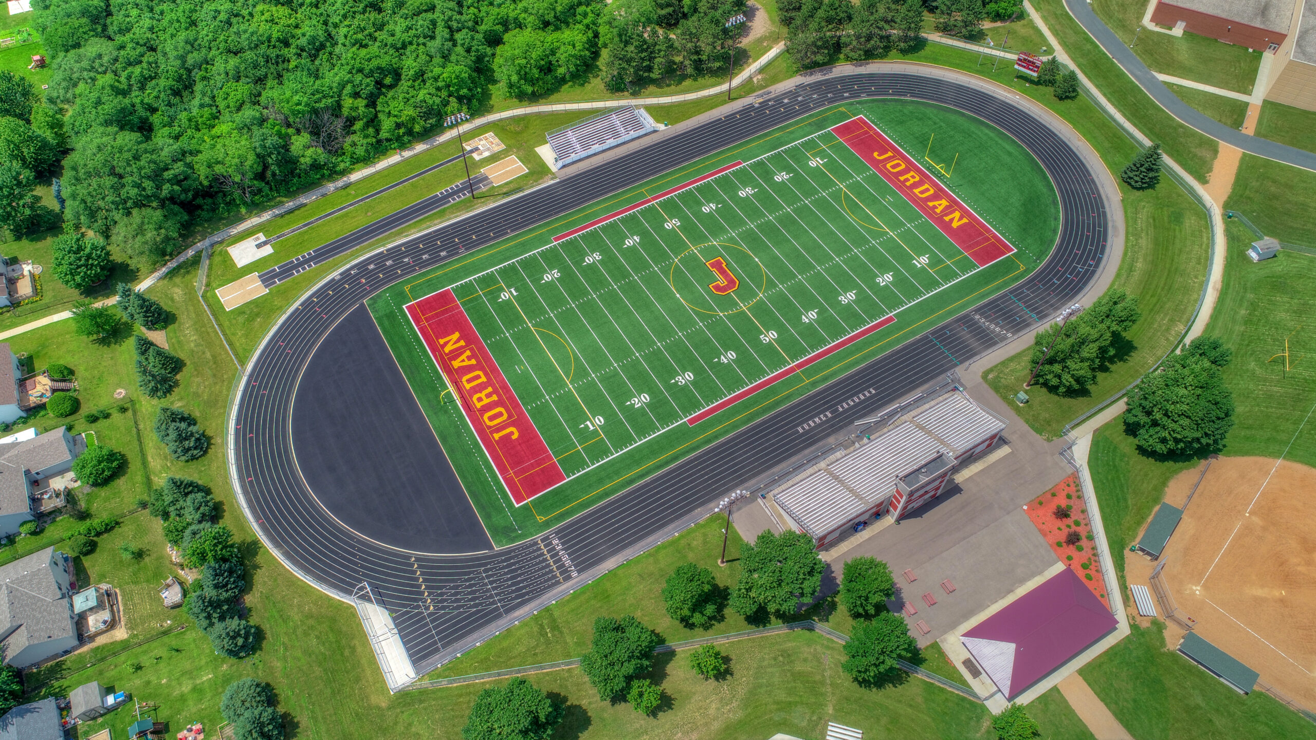 Aerial drone photo of Ames Field football stadium and track